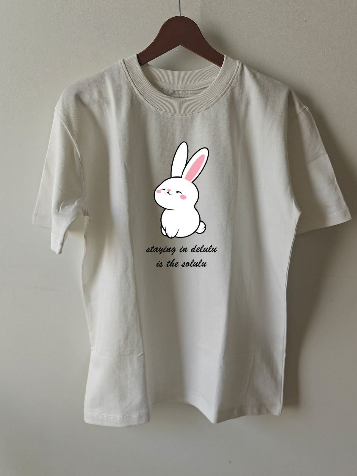 STAYING IN DELULU : Unisex Oversized T-shirt